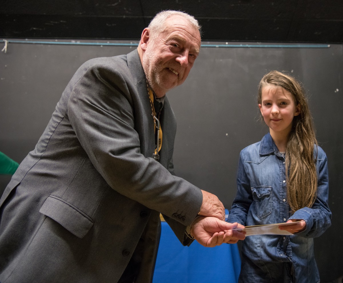 Paul Rutherford presents Kyra James with her prize